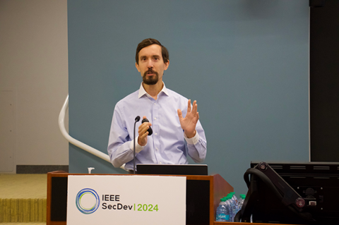 Photo of Bryan Parno speaking at the 2024 IEEE Security Development Conference